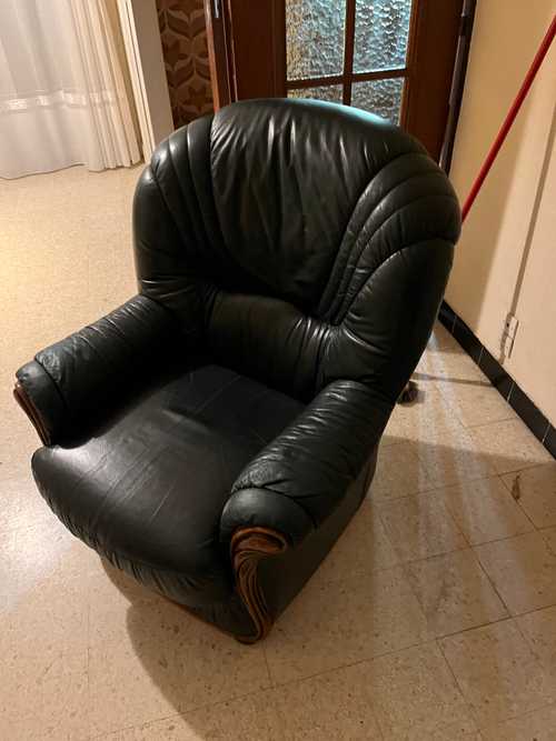 Deux fauteuils cuir